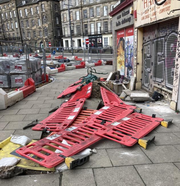 Montgomery Street fallen barriers on pavement