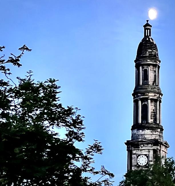 Moon (just) over steeple of Broughton St Mary's Parish Church